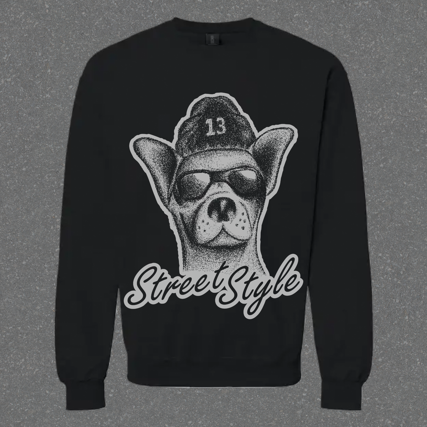 Black sweatshirt with a graphic of a dog wearing a cap and sunglasses, and the text 'Street Style'.