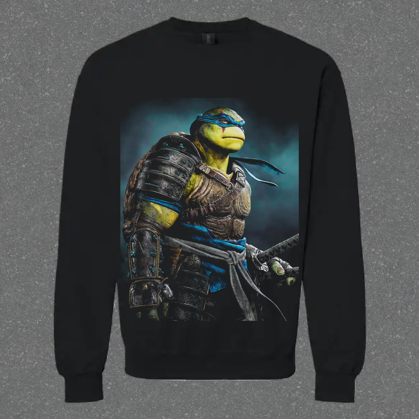 Black sweatshirt with a graphic of a turtle-like character holding a sword on a gray background