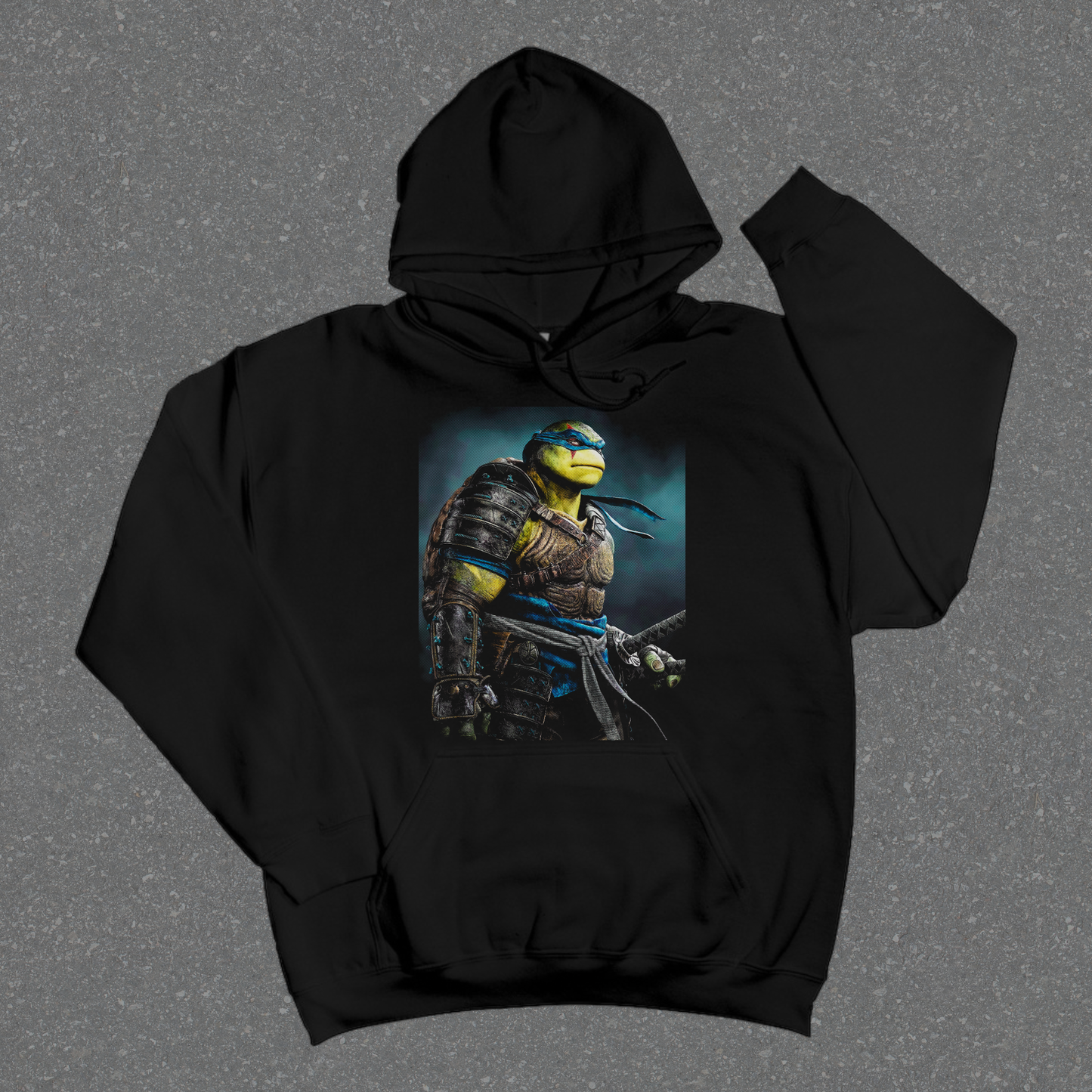 Black hoodie with a graphic of a character on a gray background